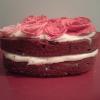 My Valentine's Day Red Velvet mini Heart cake filled with cream cheese frosting topped with white chocolate and hand-crafted fondant roses
