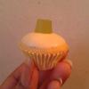 My confetti cake (confetti=rainbow sprinkles inside cake) covered in white chocolate and topped with a green midget gem