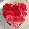 My Valentine's Day Red Velvet mini Heart cake filled with cream cheese frosting topped with white chocolate and hand-crafted fondant roses