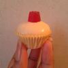 My confetti cake (confetti=rainbow sprinkles inside cake) covered in white chocolate and topped with a pink midget gem