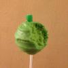 Apple style cake pops with peppermint interior, dipped in white chocolate(dyed green), with apple flavour log stalk, (green candy)