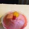 Marbled pink peppermint cupcake with a candy candle