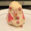 My melting snoman: cake ball with marshmallow ontop covered in white chocolate, with a toffee nose, red candy carpet scarf and cola millions for eyes and buttons
